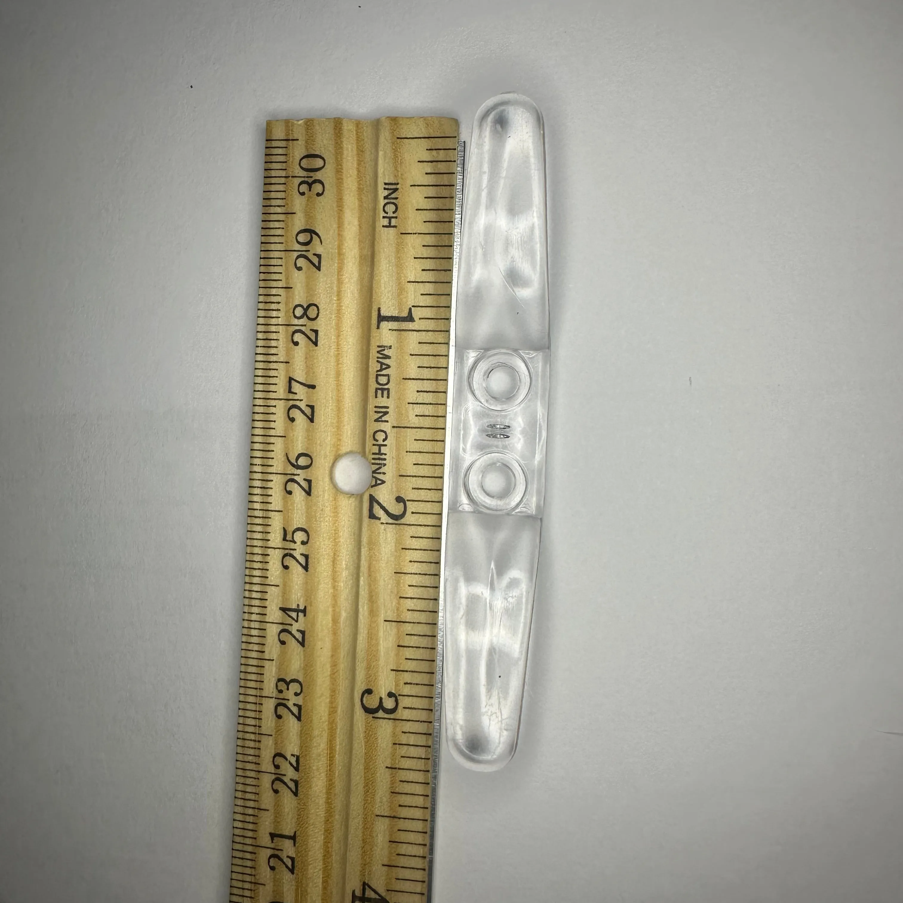 3-1/8" Clear Lucite Cord Cleat (10 Per Bag)